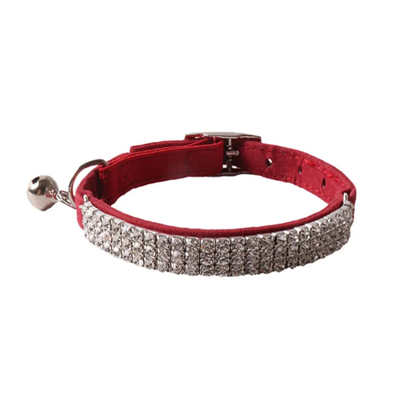 Flocked elastic cat collar with quick-release buckle shown in pink, length 28cm.