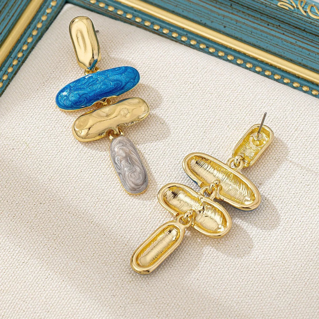 A pair of multicolour geometric stud earrings for women with a zinc alloy base and electroplated finish.