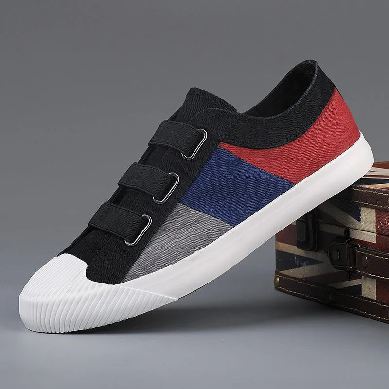Men's canvas sneakers with rubber sole in multiple colour options showing low top design and elastic band