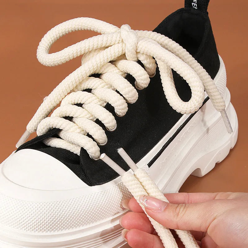 Round woven shoelaces in white, beige, and black colours showing thickness options