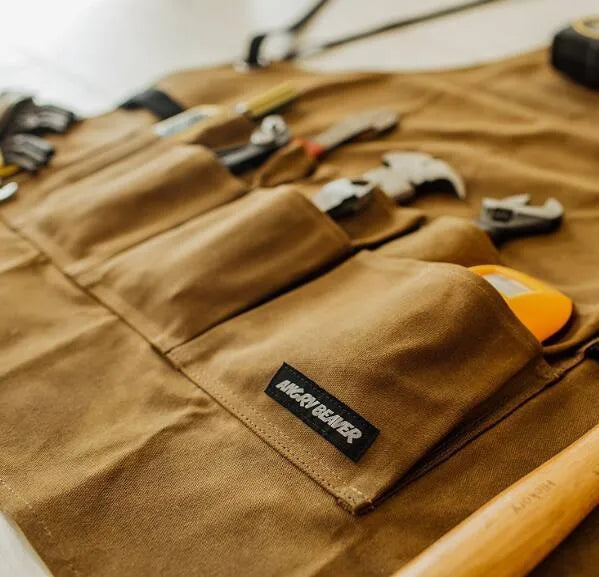 Yellow coated canvas leather webbing apron with adjustable straps for men and women, suitable for workshop and DIY tasks.