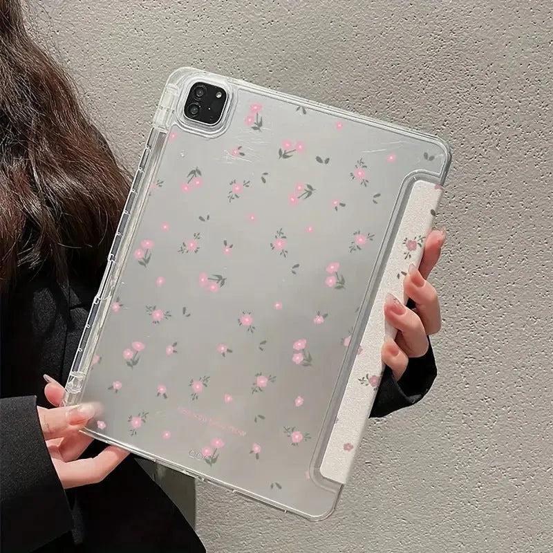 Transparent tri-fold Apple iPad case with cartoon floral print showing magnetic stand function.