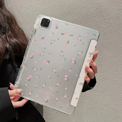 Transparent tri-fold Apple iPad case with cartoon floral print showing magnetic stand function.