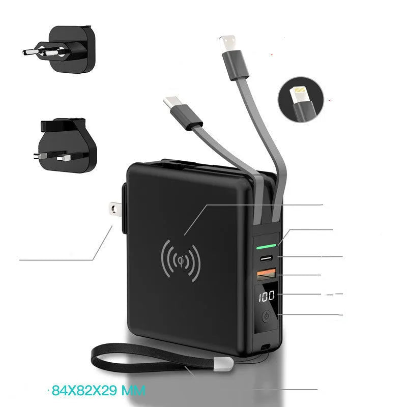 Black Super QI 10000mAh power bank with wireless charging top and foldable UK plug adapter attached.