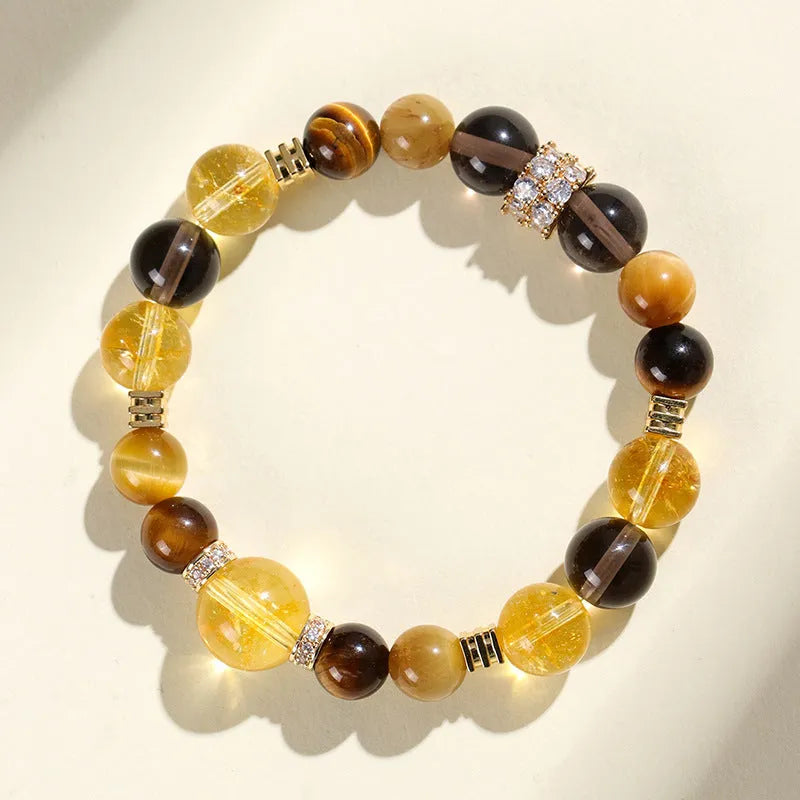 Natural yellow artificial crystal tower bead bracelet with 10mm beads on wrist
