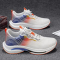 Men's low-top sneaker with mesh lining, rotating buckle, and rubber sole in white and orange colour.