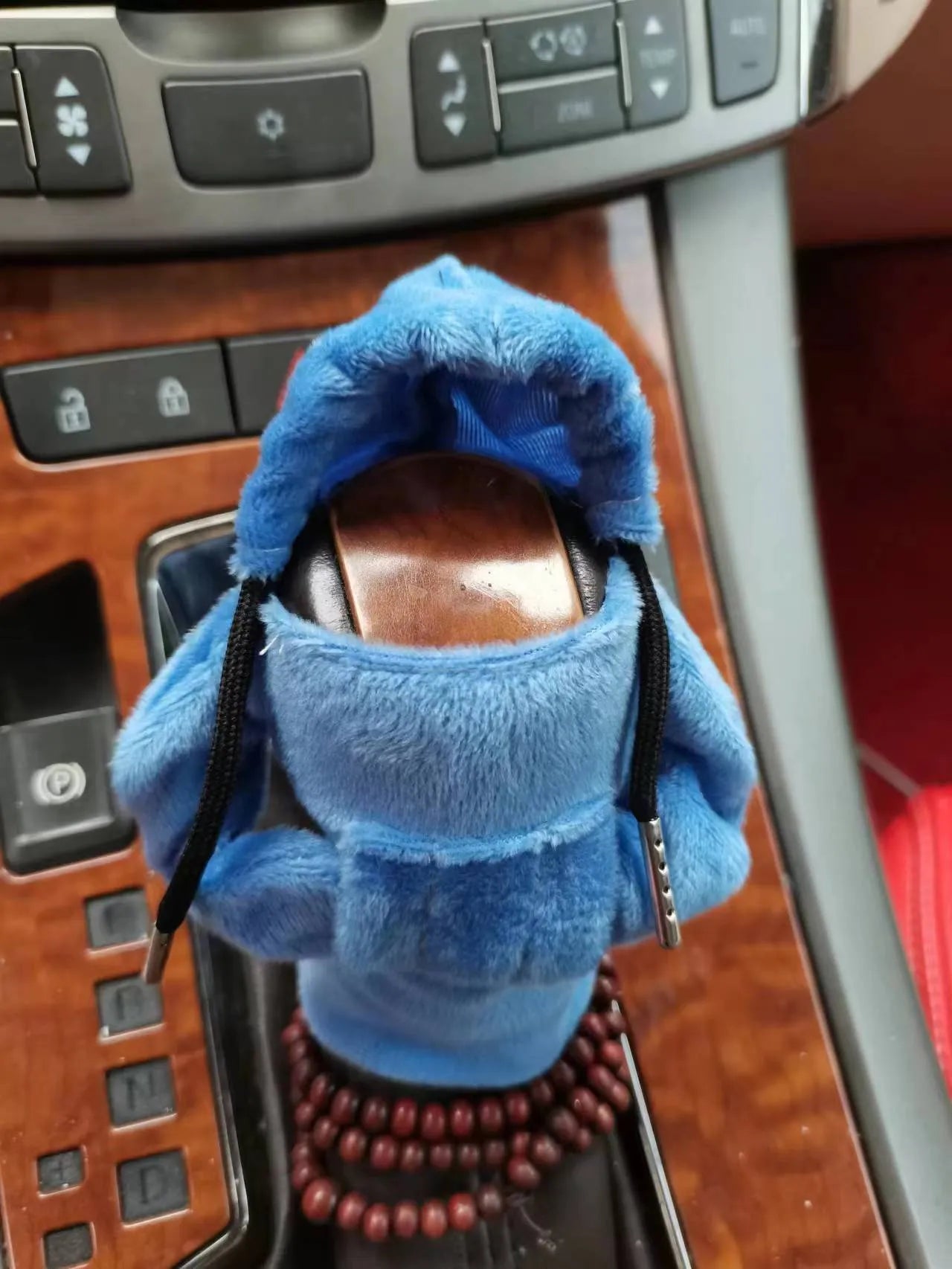 Dutch velvet car gear handle sleeve cover in multiple colours on a gear lever