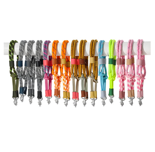 Braided nylon rope shoulder strap with cowhide leather accents and an alloy buckle.