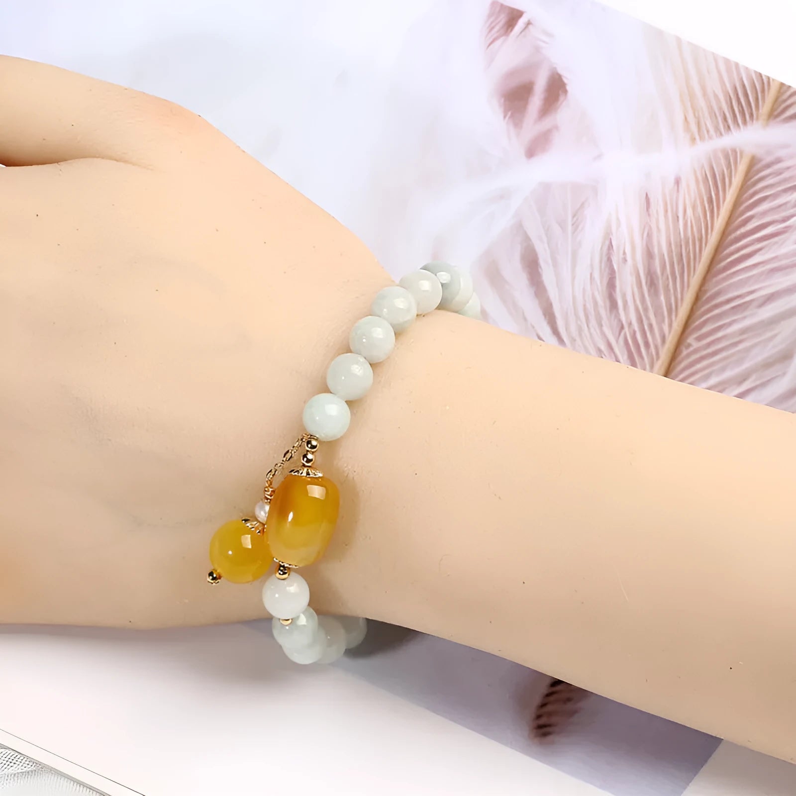Women's ethnic geometric bracelet with hanging red agate beads and 14K gilded finish