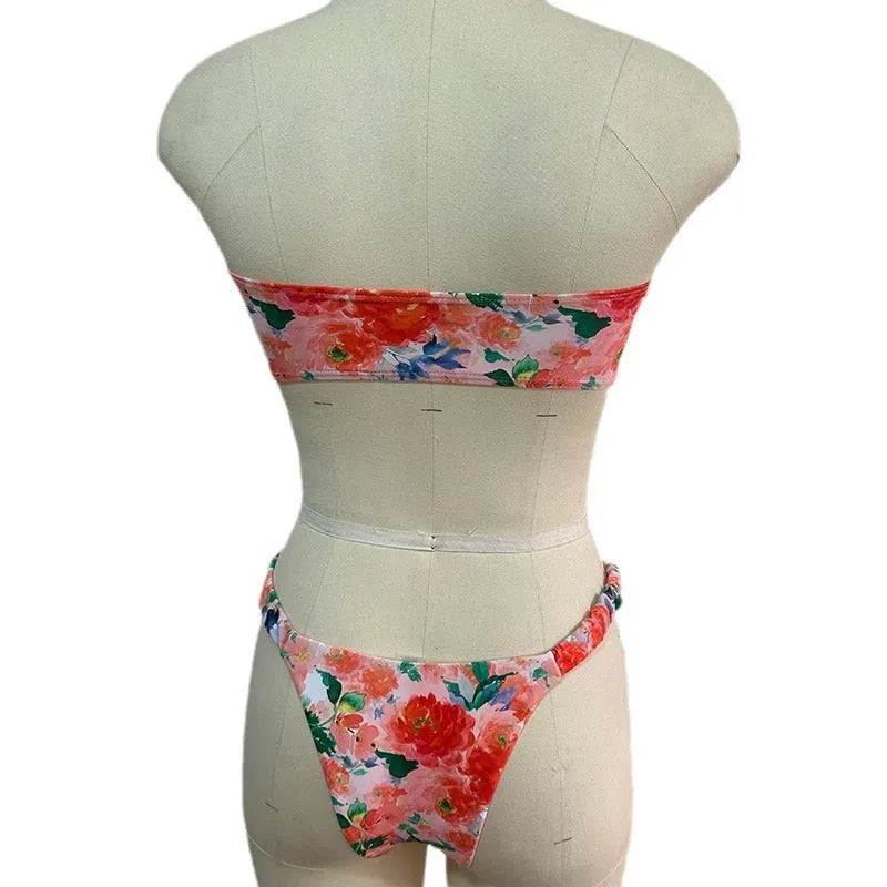 Blue floral print bikini set with lace trim on a sleeveless tube top and matching briefs.