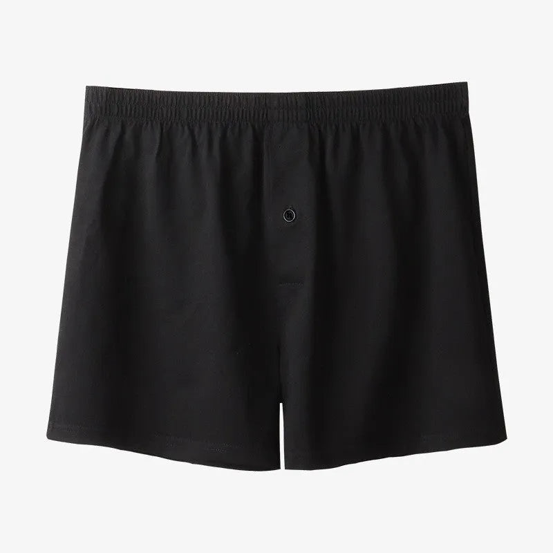 Men's pure cotton boxer shorts in black colour showing loose fit and high waist design
