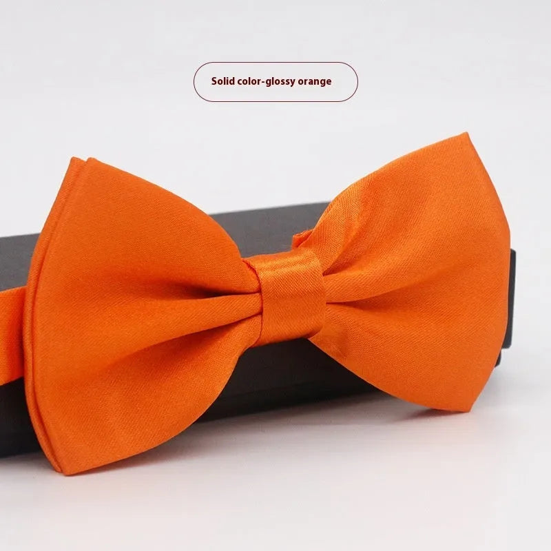 Men's solid colour flat head polyester bow tie on white background