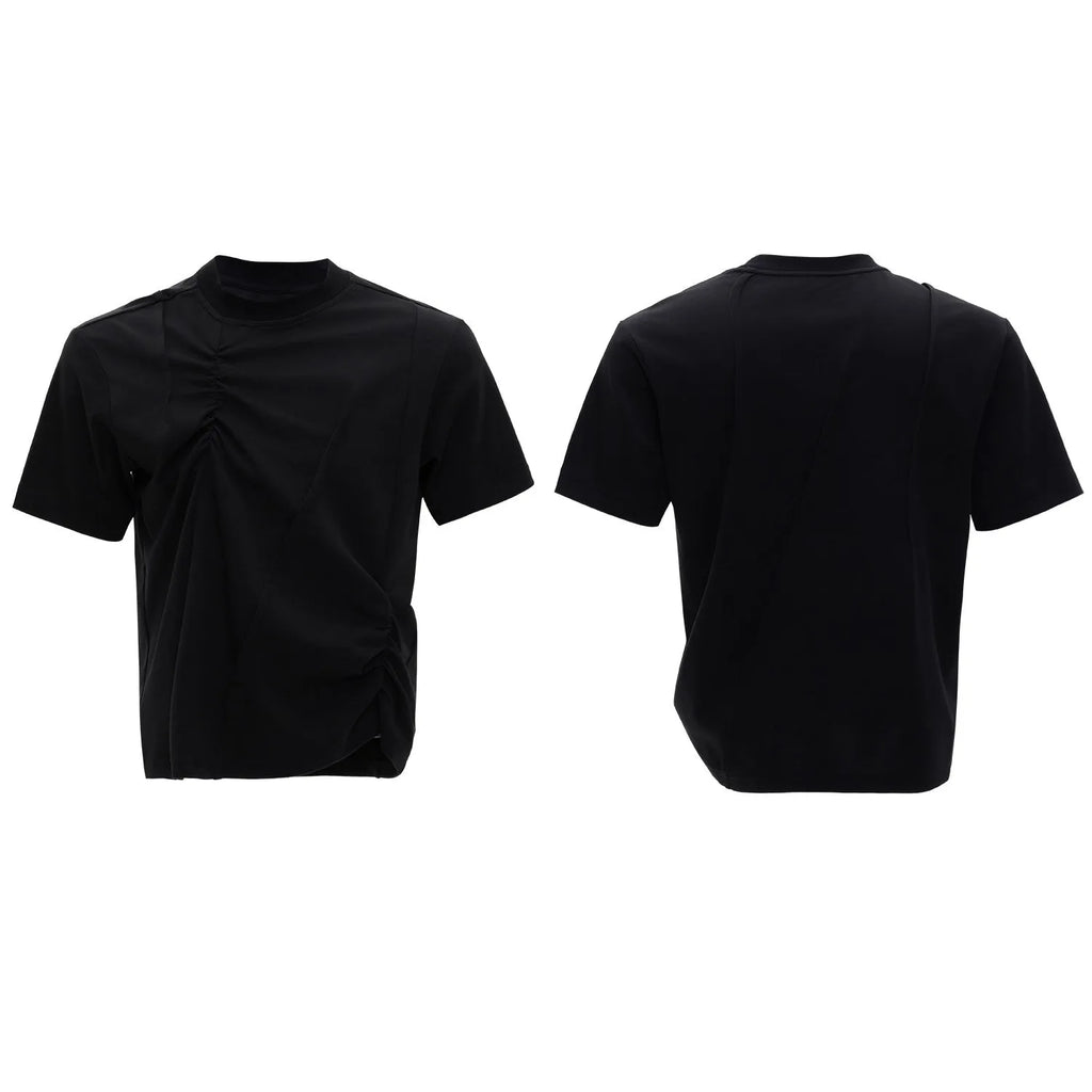 Men's grey pleated cotton t-shirt with round neck and short sleeves on a loose fit model
