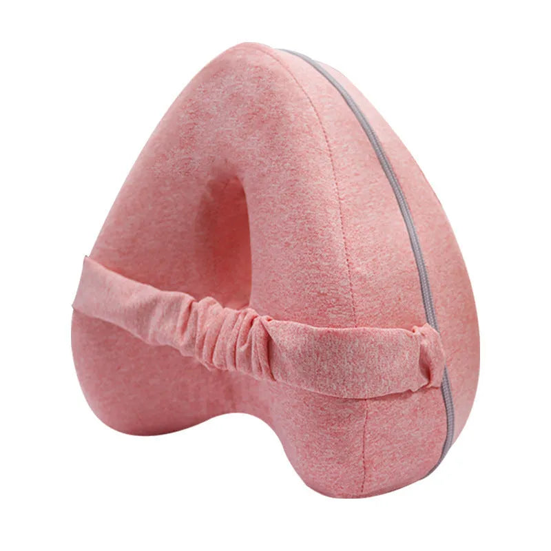 Heart-shaped dark blue memory foam leg pillow for adult use.