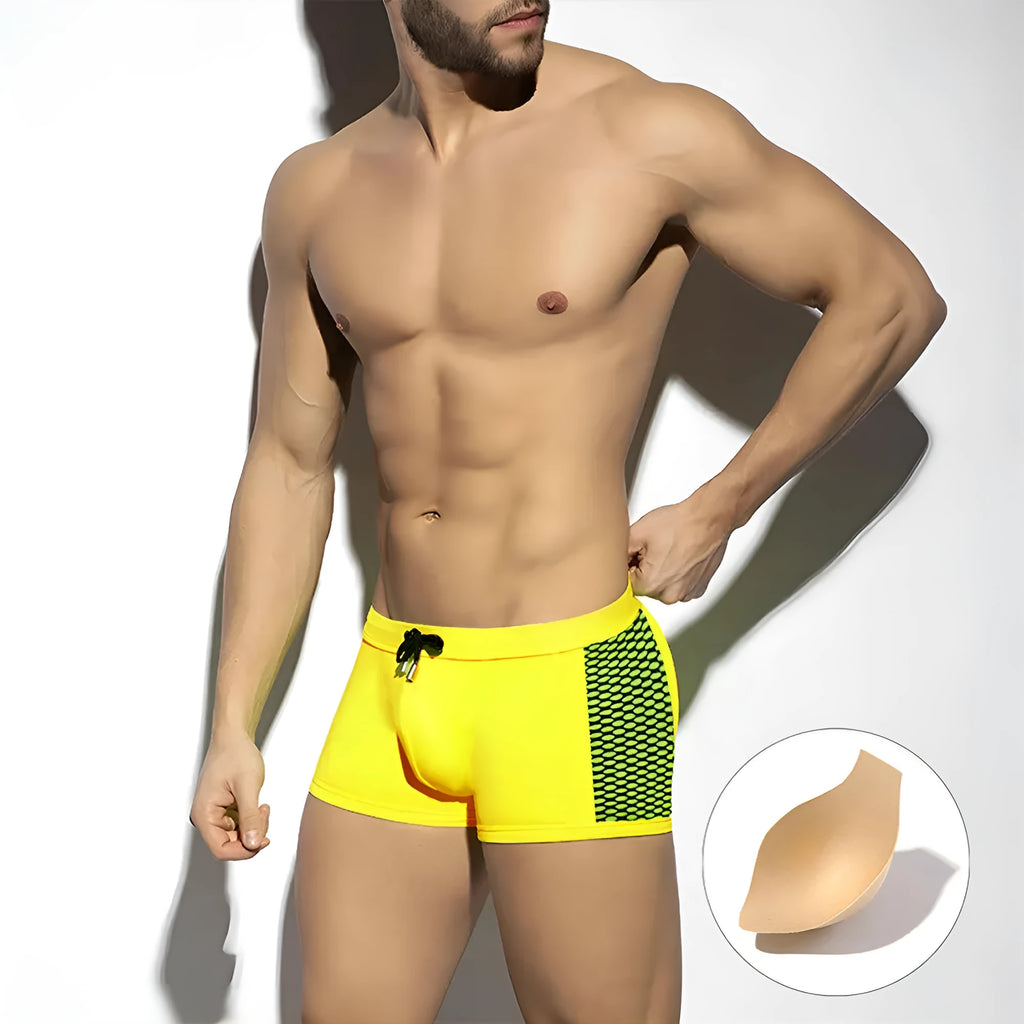 Men's polka dot print quick-dry swimming boxers in black, dark blue, or yellow with ribbon cup detail