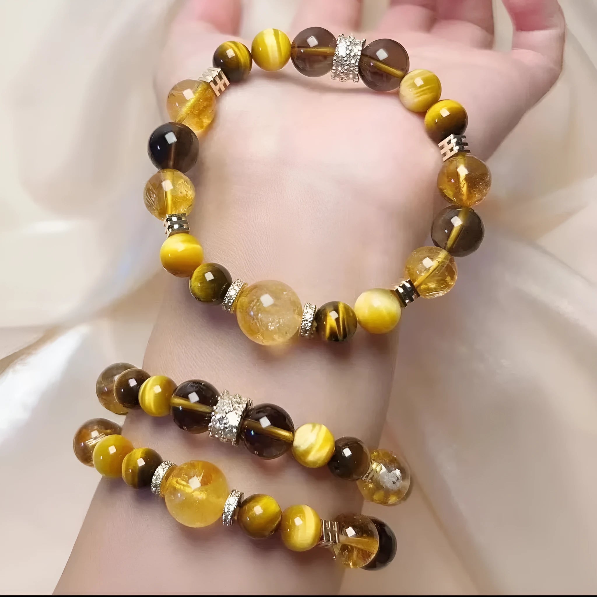 Natural yellow artificial crystal tower bead bracelet with 10mm beads on wrist