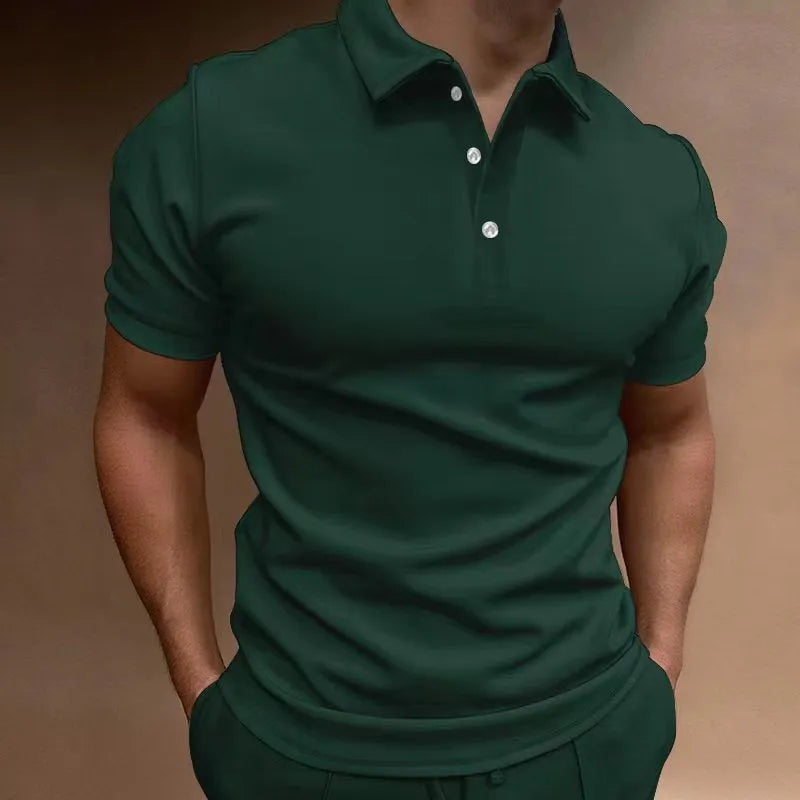 Man modelling a loose fit grey cotton blend short sleeve t-shirt.