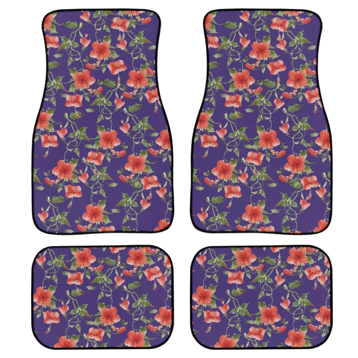 Set of four black rubber car floor mats with a textured surface and raised edges, shown in a vehicle footwell.