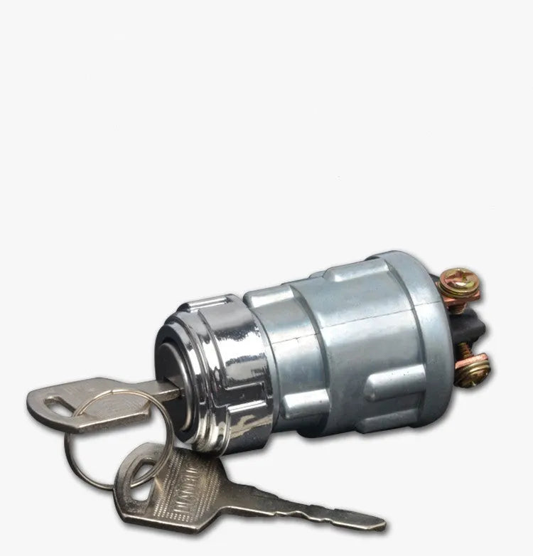 Copper vehicle ignition switch with a key for trucks and forklifts.