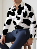 Man wearing a loose-fit Hawaiian shirt with floral pattern, long sleeves, and a cardigan style.