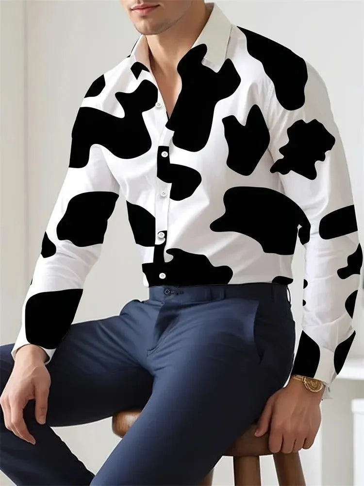 Man wearing a loose-fit Hawaiian shirt with floral pattern, long sleeves, and a cardigan style.