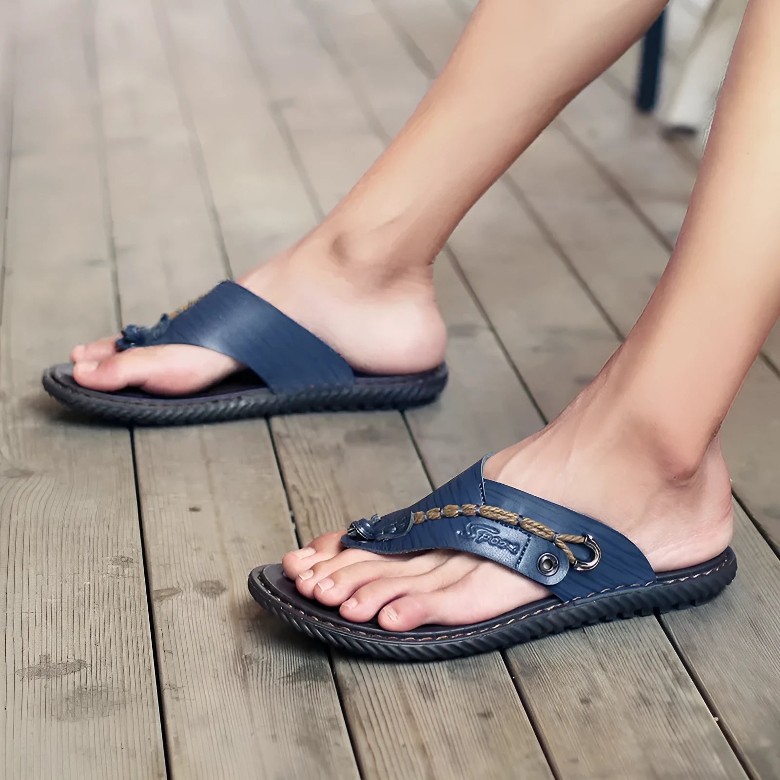 Men's black lightweight slippers with non-slip soles on wooden floor