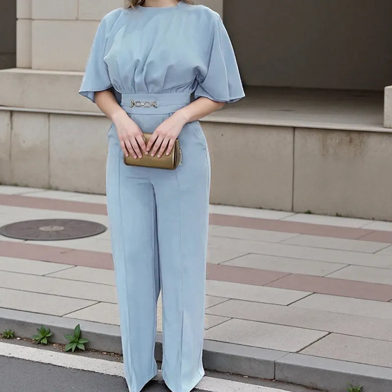 Blue men's casual suit with long sleeves and trousers on a hanger