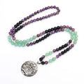 Dongling long necklace with geometric lotus pendant and adjustable cord alongside matching bracelet