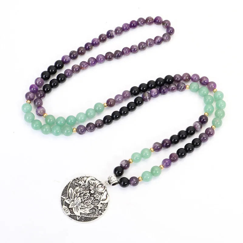 Dongling long necklace with geometric lotus pendant and adjustable cord alongside matching bracelet