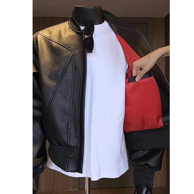 Men's black extended length PU leather jacket on a hanger, showing tight fit and 100cm length.