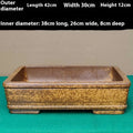 Straight-sided shallow rectangular Yixing zisha clay flowerpot in natural purple colour.
