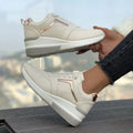 Women's wedge platform casual shoes in PU leather with a lace-up front and rubber sole.