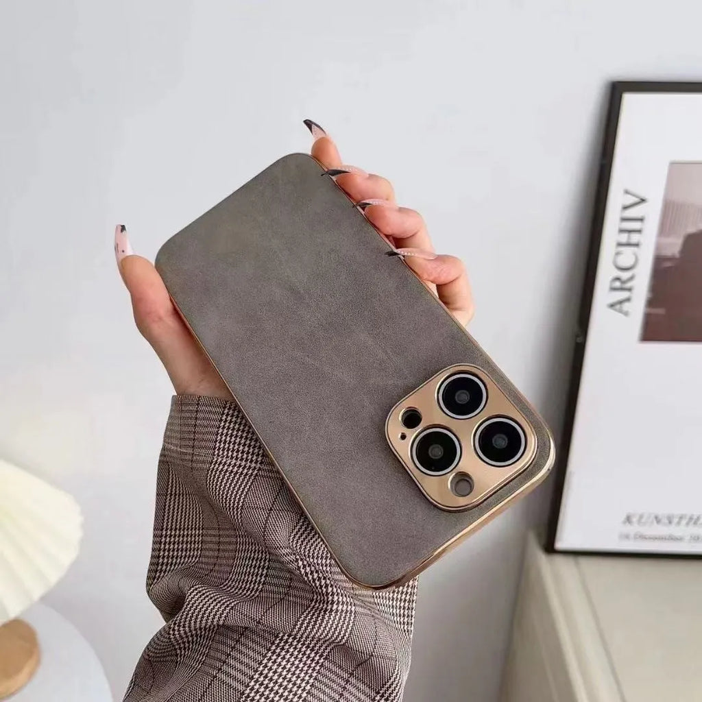 Slim black leather texture phone case fitted on an iPhone 14, showing textured finish and precise camera cutouts.