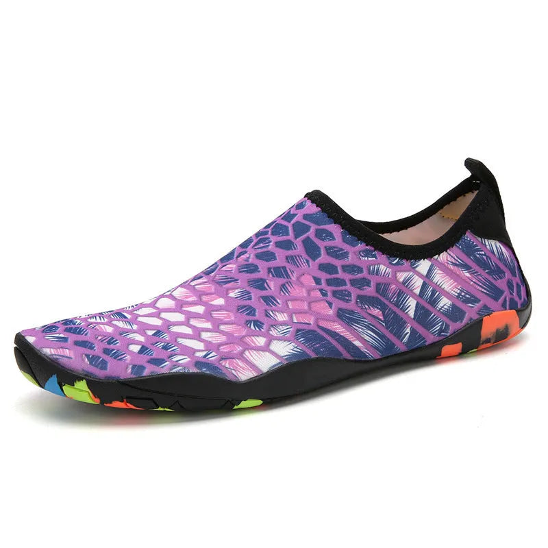 Blue Lycra beach wading shoes with EVA sole for men and women, shown on a sandy background.