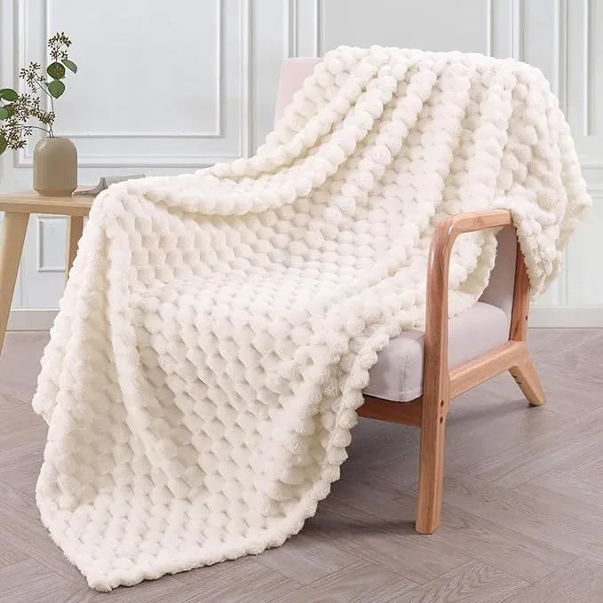 Children's soft plaid polyester blanket shown in camel colour, suitable for nap time.