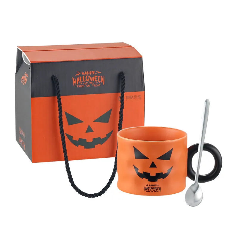 Orange and white Halloween pumpkin-shaped ceramic mug with handle on a table.