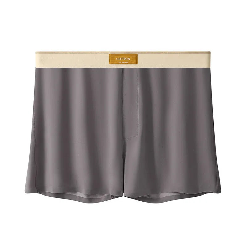 Men's solid colour ice silk underwear with a loose fit and mid waistband on a neutral background.