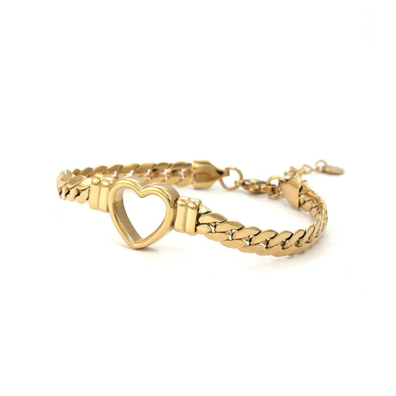 Fashion simple hollow heart titanium steel bracelet in BR-26 gold colour with electroplated finish