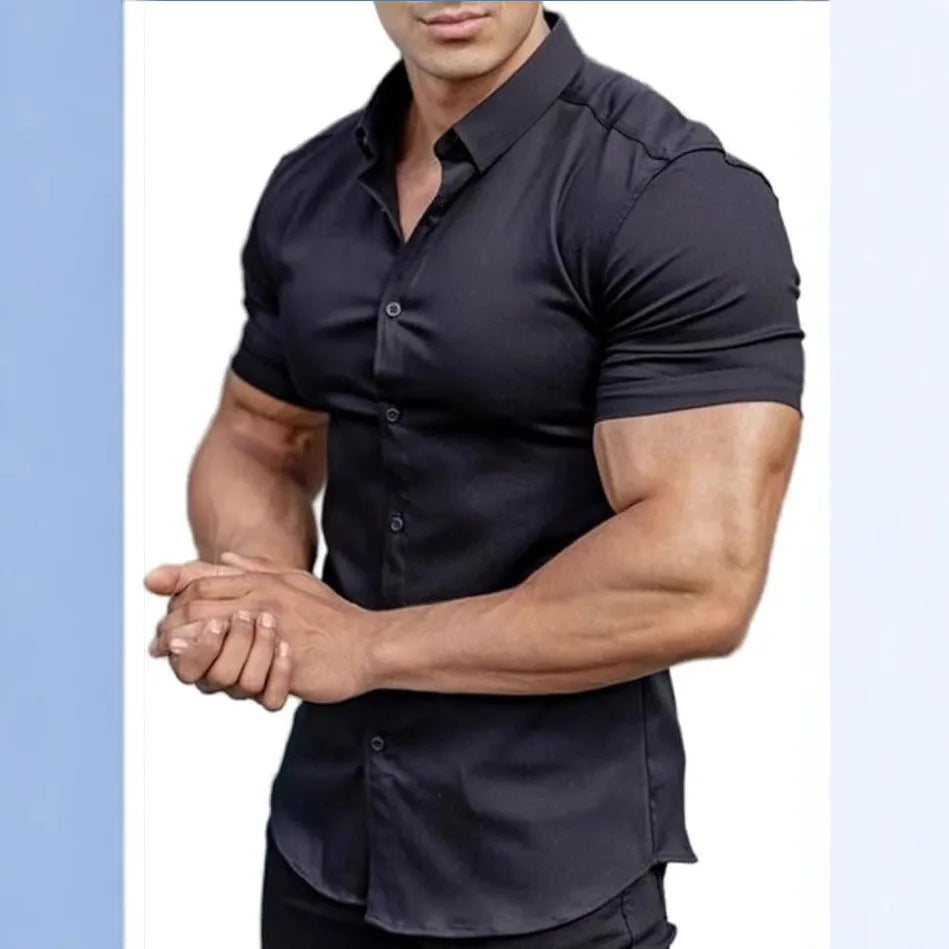 Man wearing a brown short sleeve printed casual shirt with a collar.