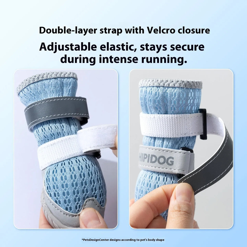 Pair of blue cartoon-style dog shoes with breathable PU uppers and anti-scald soles on a wooden surface.