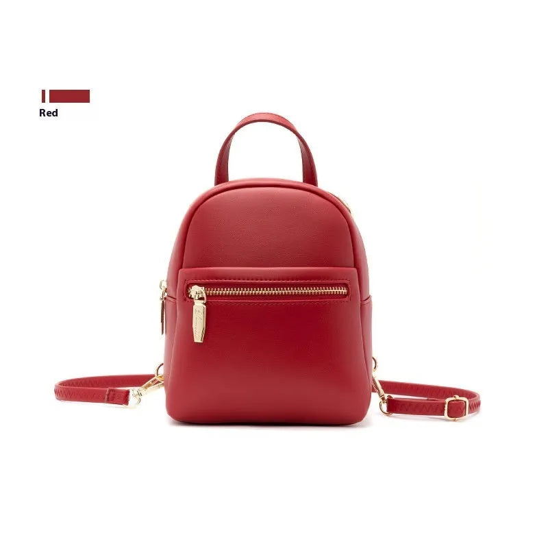 Soft PU mini backpack in street trend style with contrast colour detailing and external pocket.