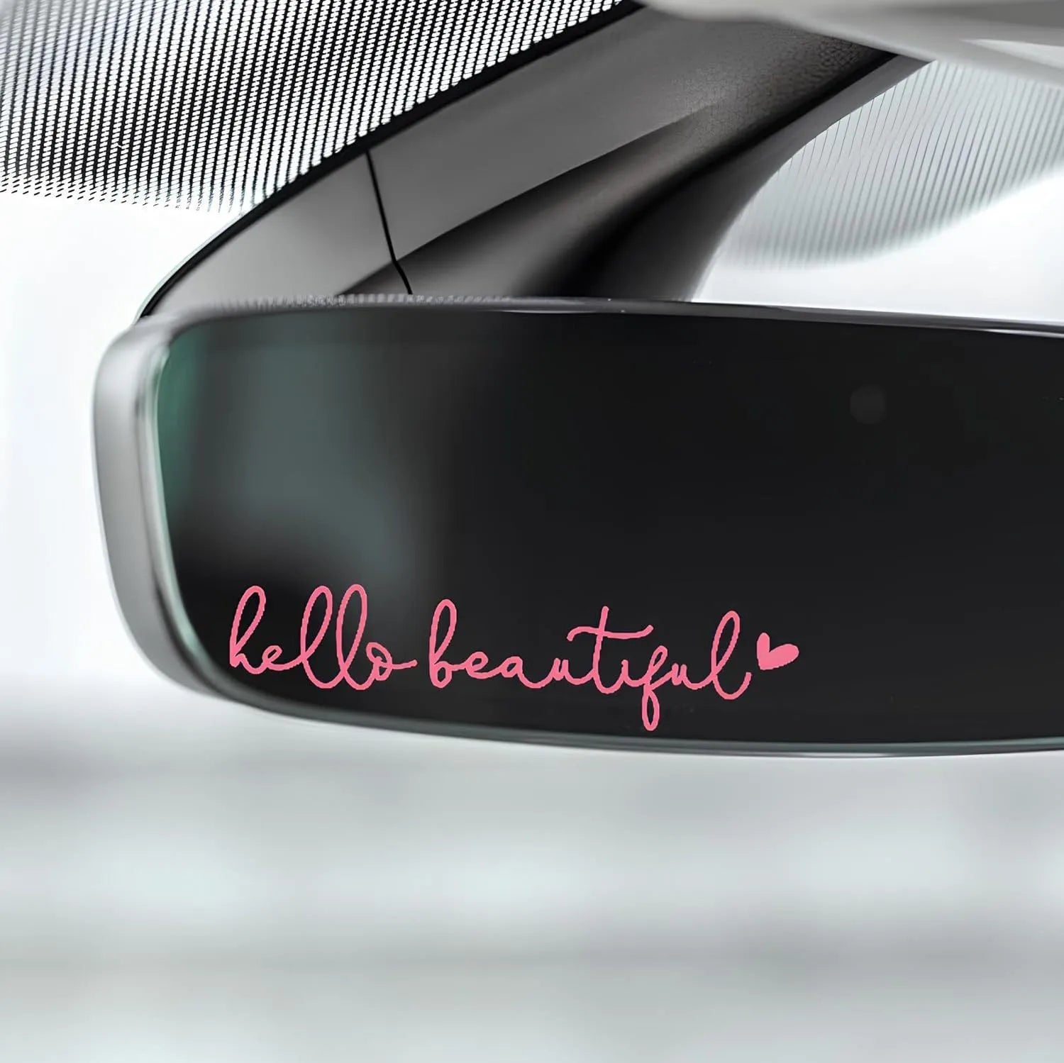 Plastic rearview mirror sticker 10x3cm in black on a car mirror