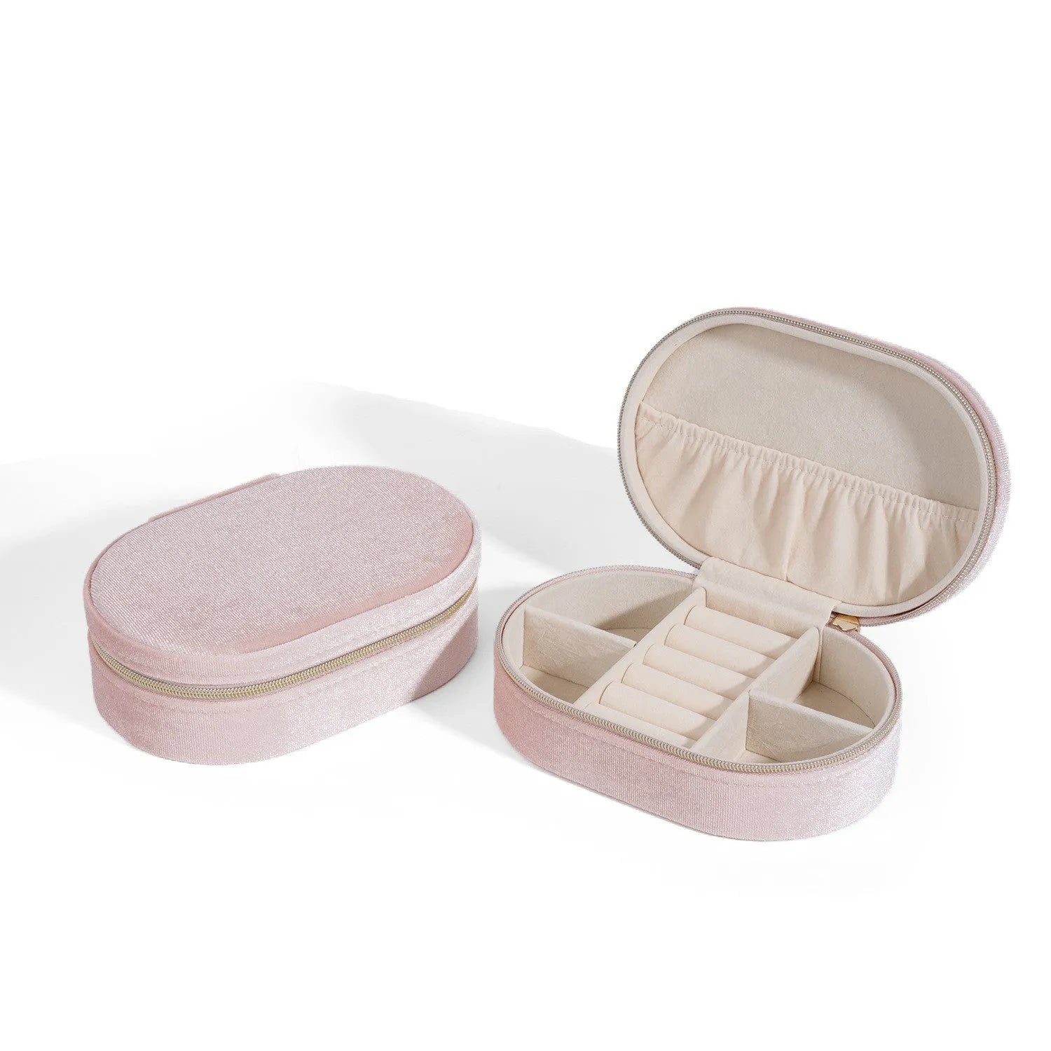 Oval velvet jewellery storage box in lake blue with internal hook for necklaces.
