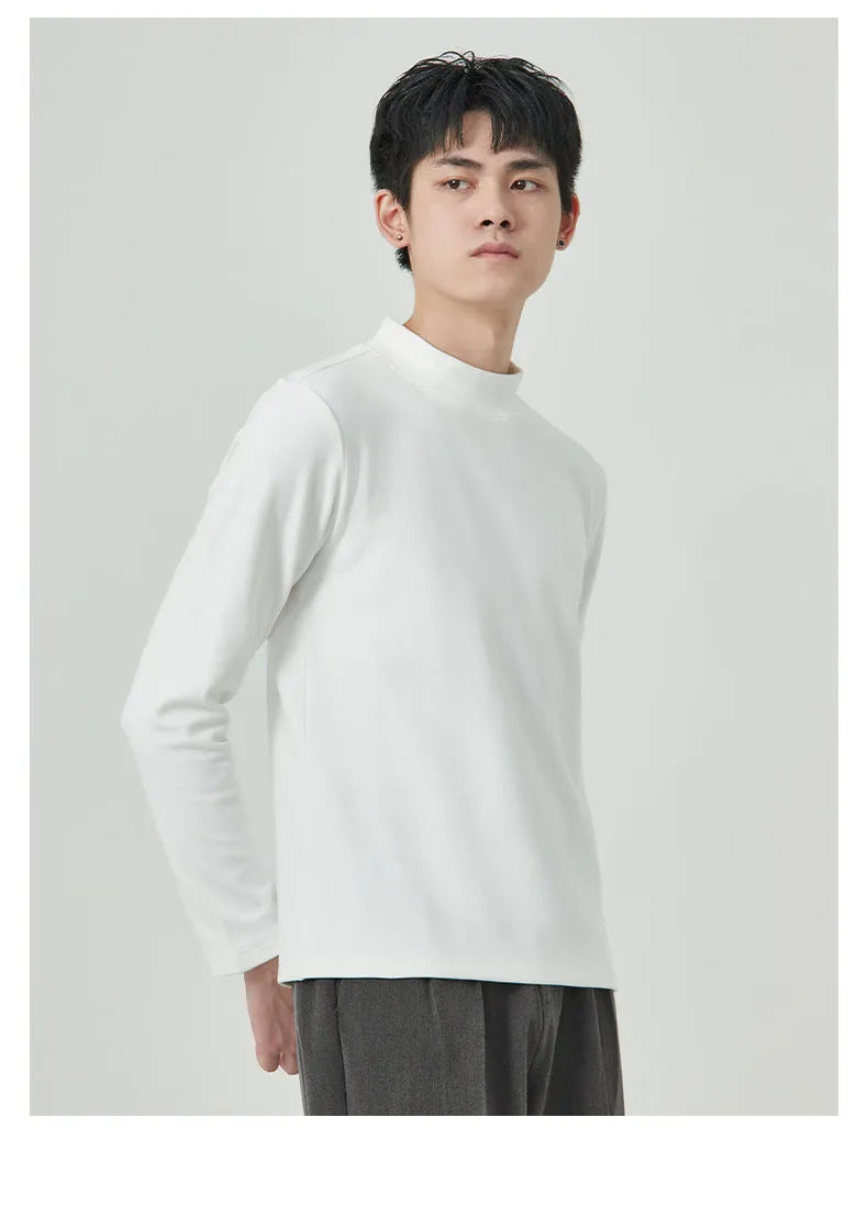 Man wearing a brown Dralon half-high collar long sleeve t-shirt for casual autumn wear.