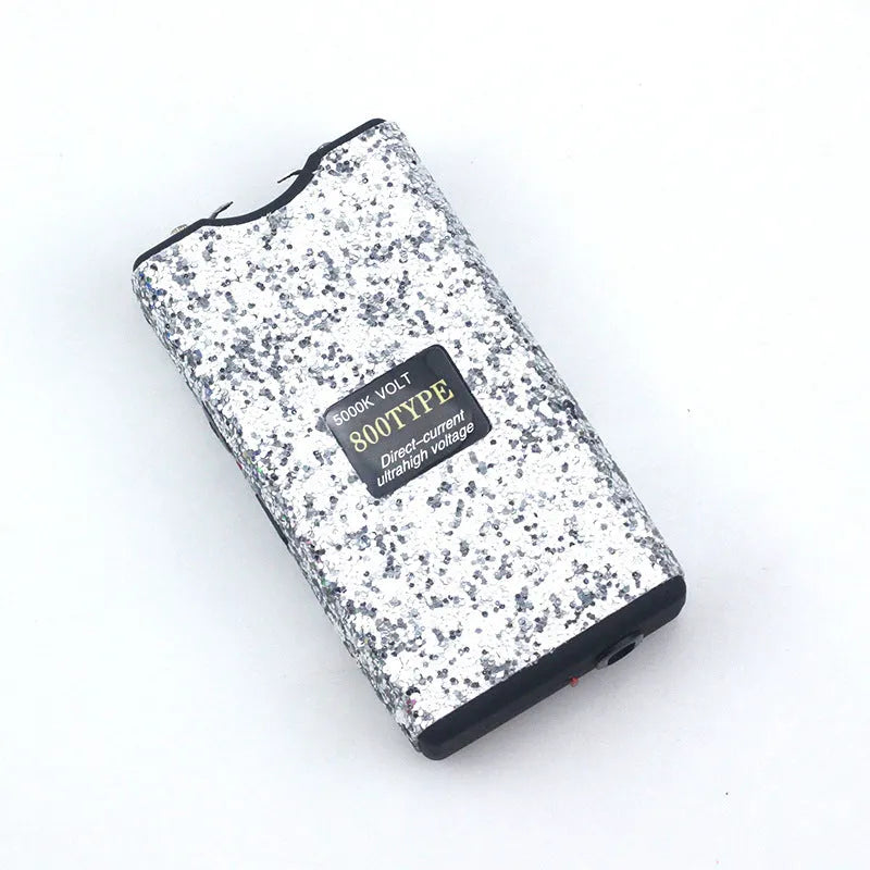 Female self-defense multi-function flashlight in plastic and resin, compact portable design available in multiple colours