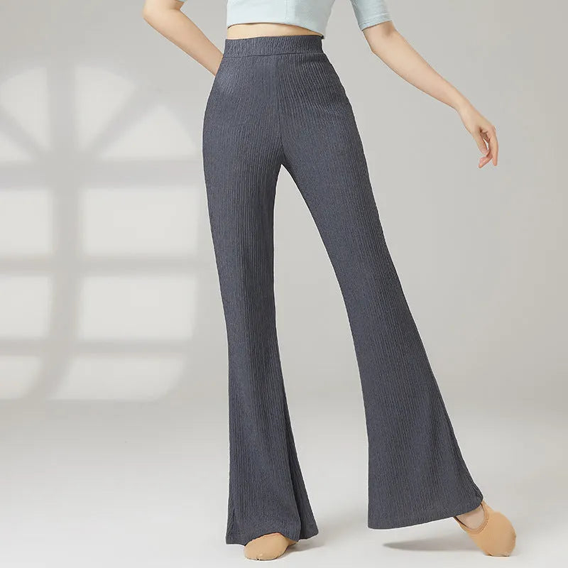 Adult female classical dance practice trousers in beige apricot, shown flat.