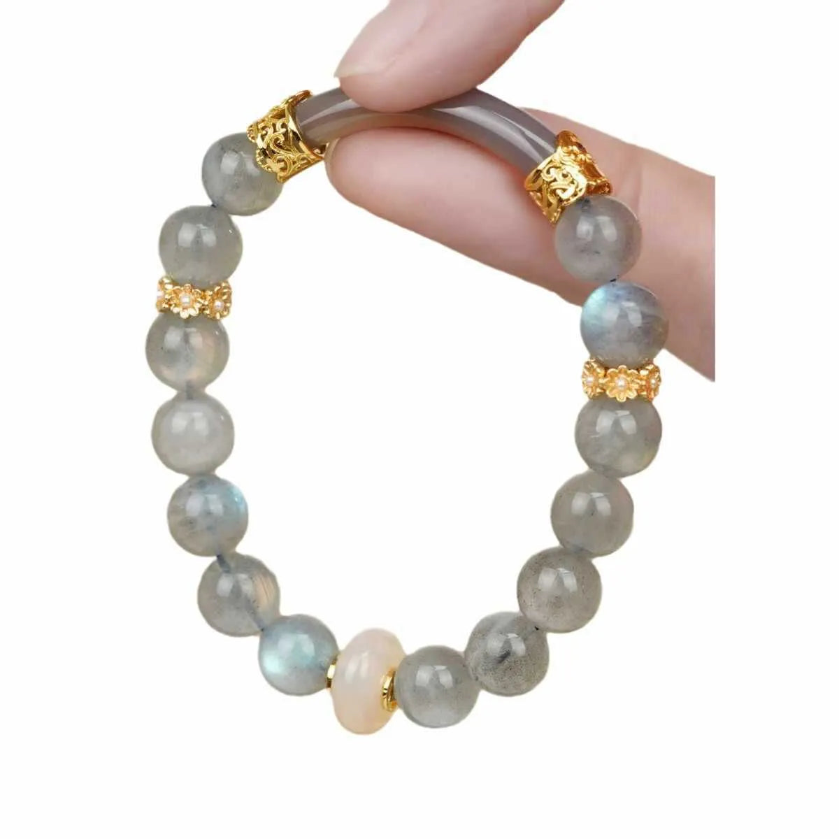 Grey moonstone women's bracelet with 8mm round beads on a wrist.