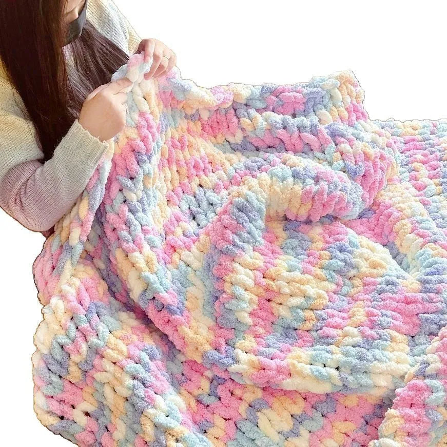 Coarse yarn chenille knitted blanket with braided gravity detail in modern colour option