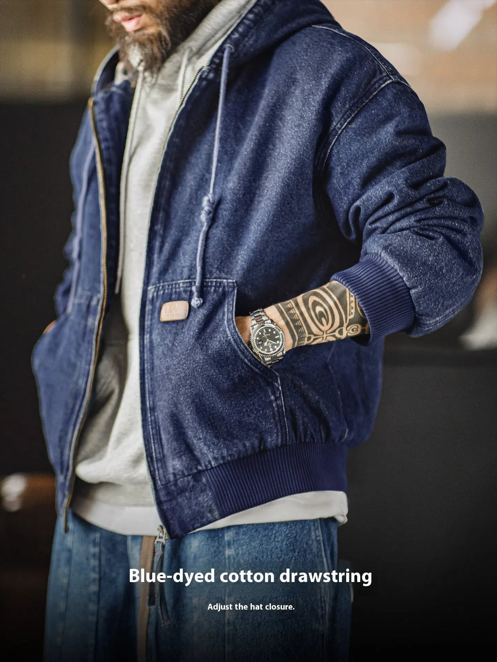 Blue tooling American retro washed denim jacket with hood and zipper front on hanger