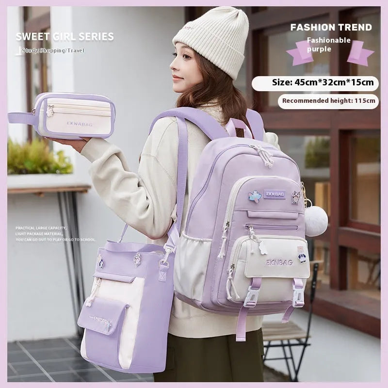 Pink waterproof Oxford cloth school backpack for girls with curved shoulder straps.